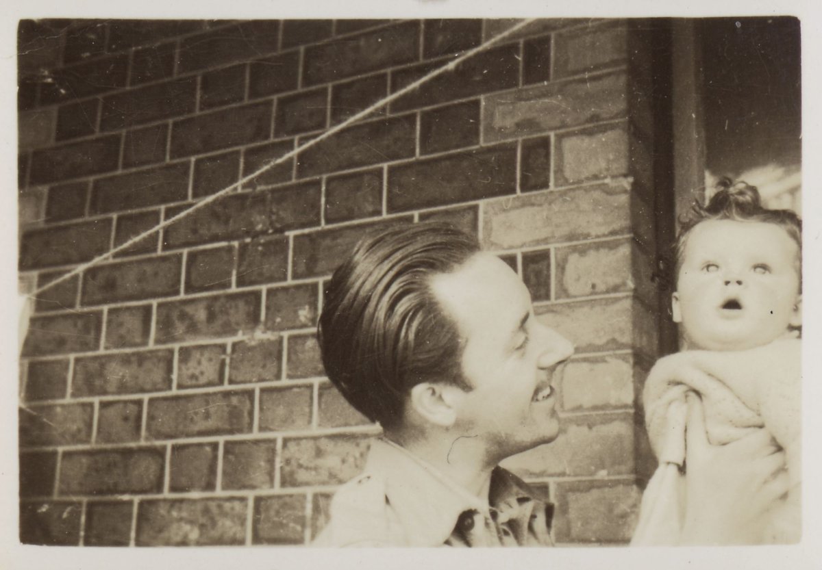 Tucker holding Sweeney on the balcony, Robe Street, St. Kilda, St Kilda (1945–46)