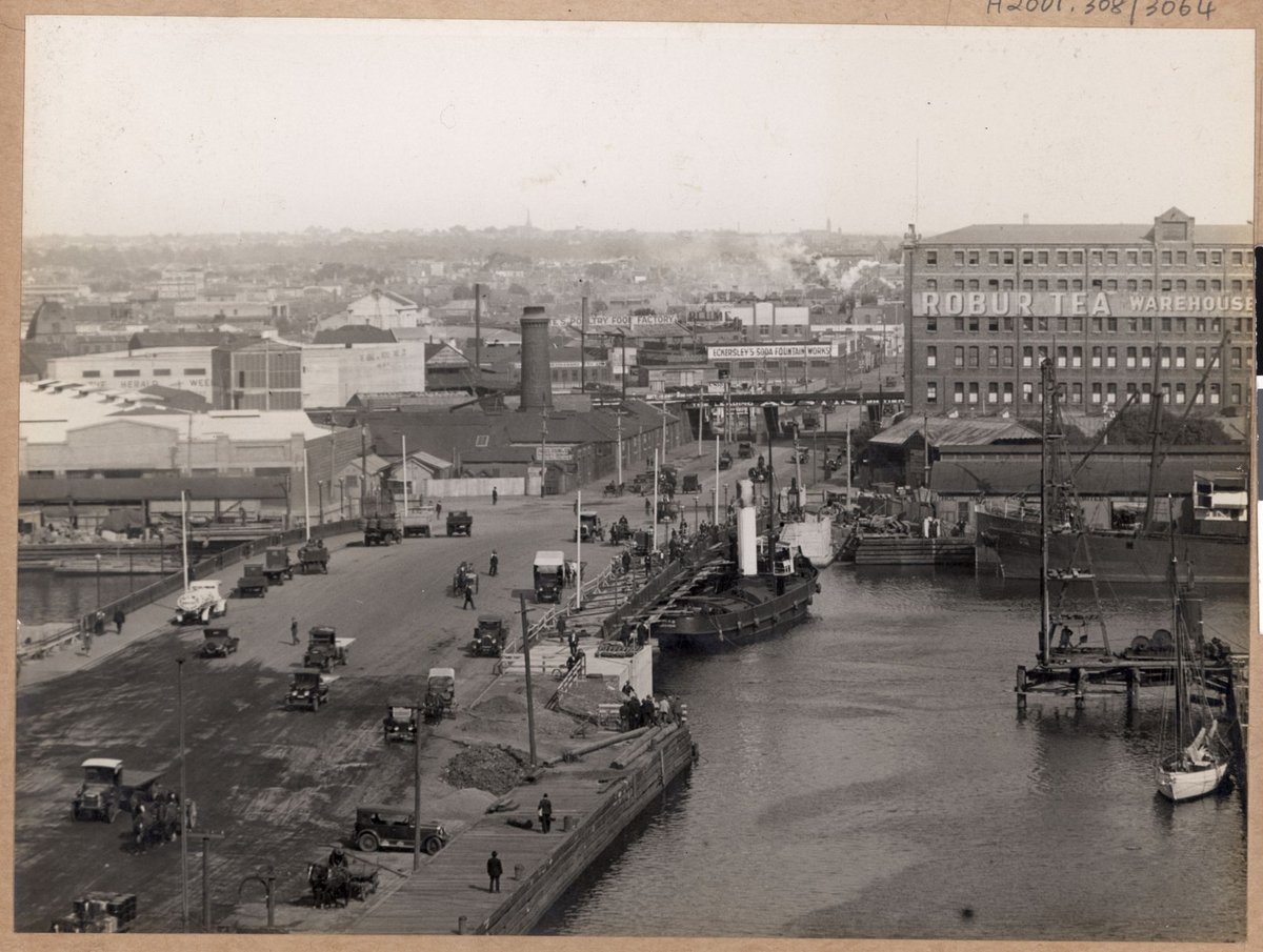 Tug Racer, which was blown by wind against bridge, slightly damaging stonework at one end of pier, [Spencer Street Bridge, Melbourne, Vic.], Melbourne City (1927–28)