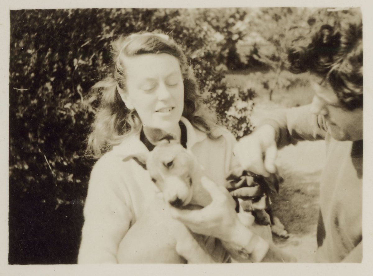 Sun and John Reed with Hank, [dog] Heidelberg '42 (1942)