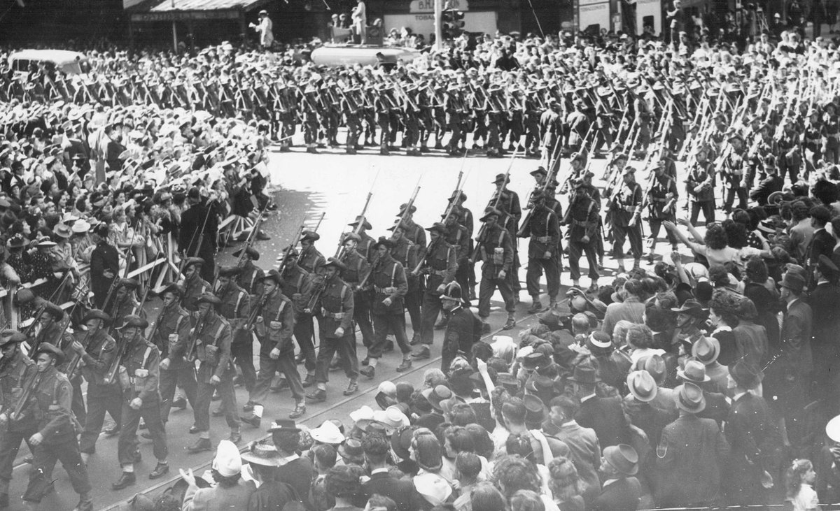 Military procession in Melbourne, near the corner of Elizabeth and Collins Streets, 1943, Melbourne City