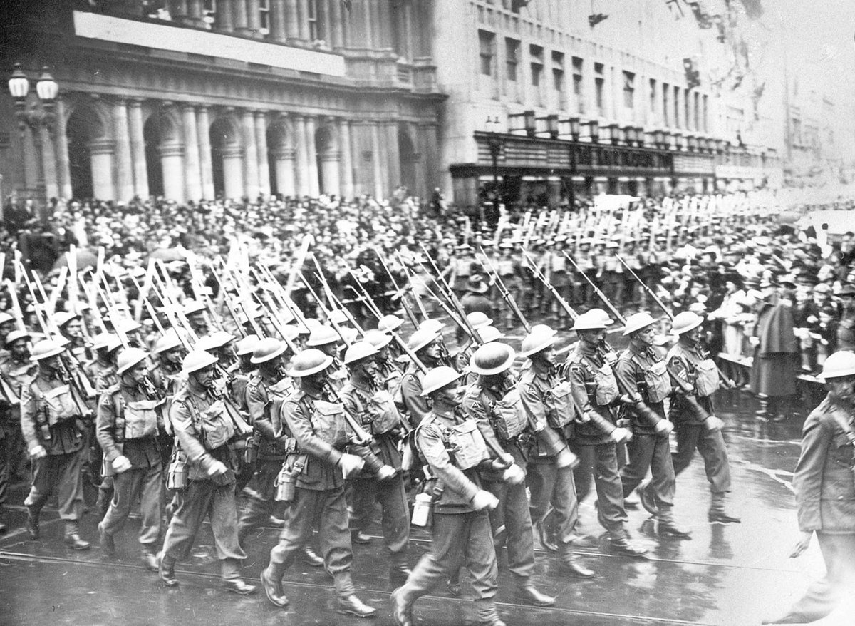 Soldiers from the A.I.F. parading down Melbourne streets, Melbourne City (c. 1941)