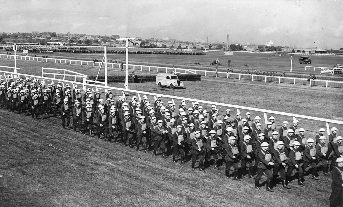 A.R.P. i.e. Air Raid Precautions display marchers, Flemington racetrack (c. 1943)