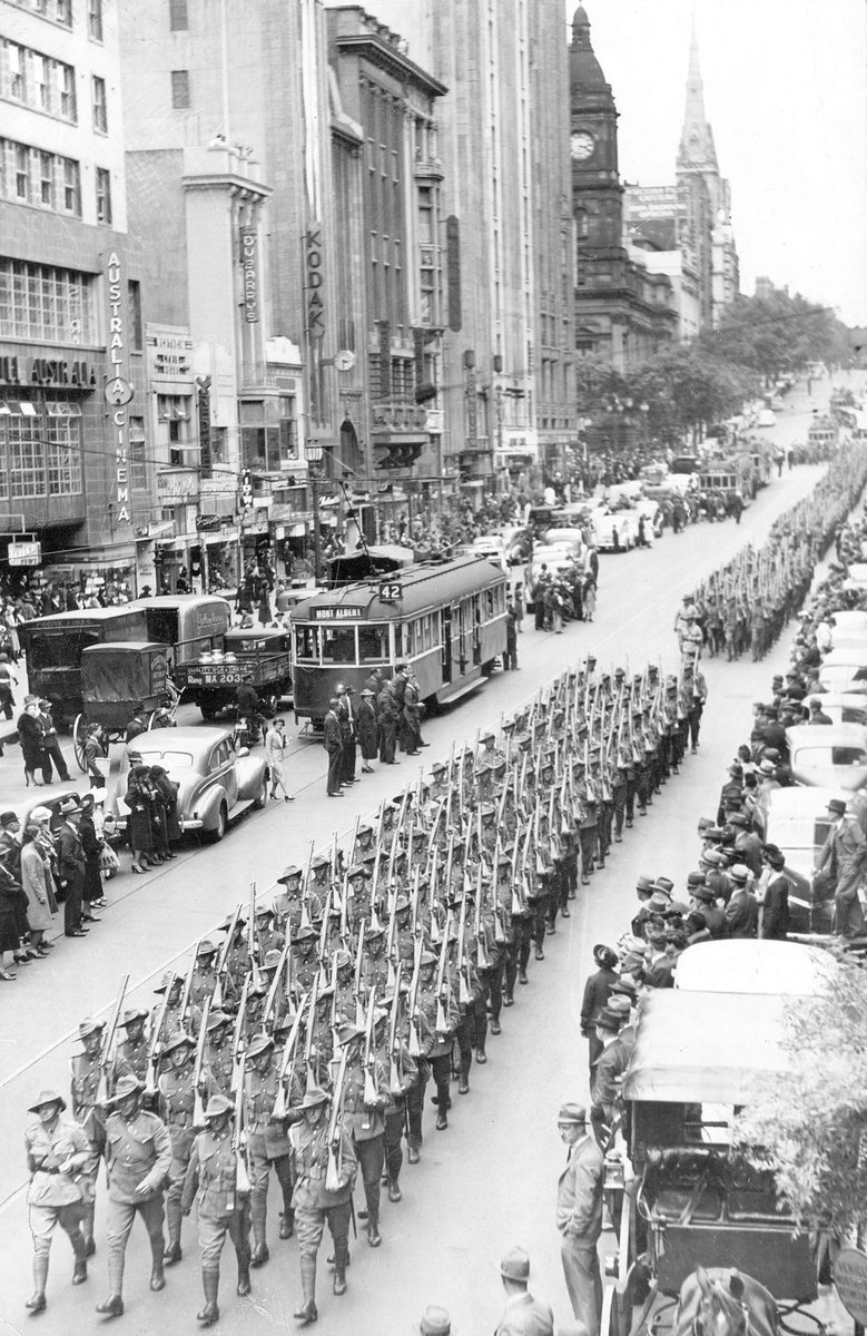 Cars and trams stopped on Collins Street for 2nd A.I.F. march, Melbourne City (1939–44)