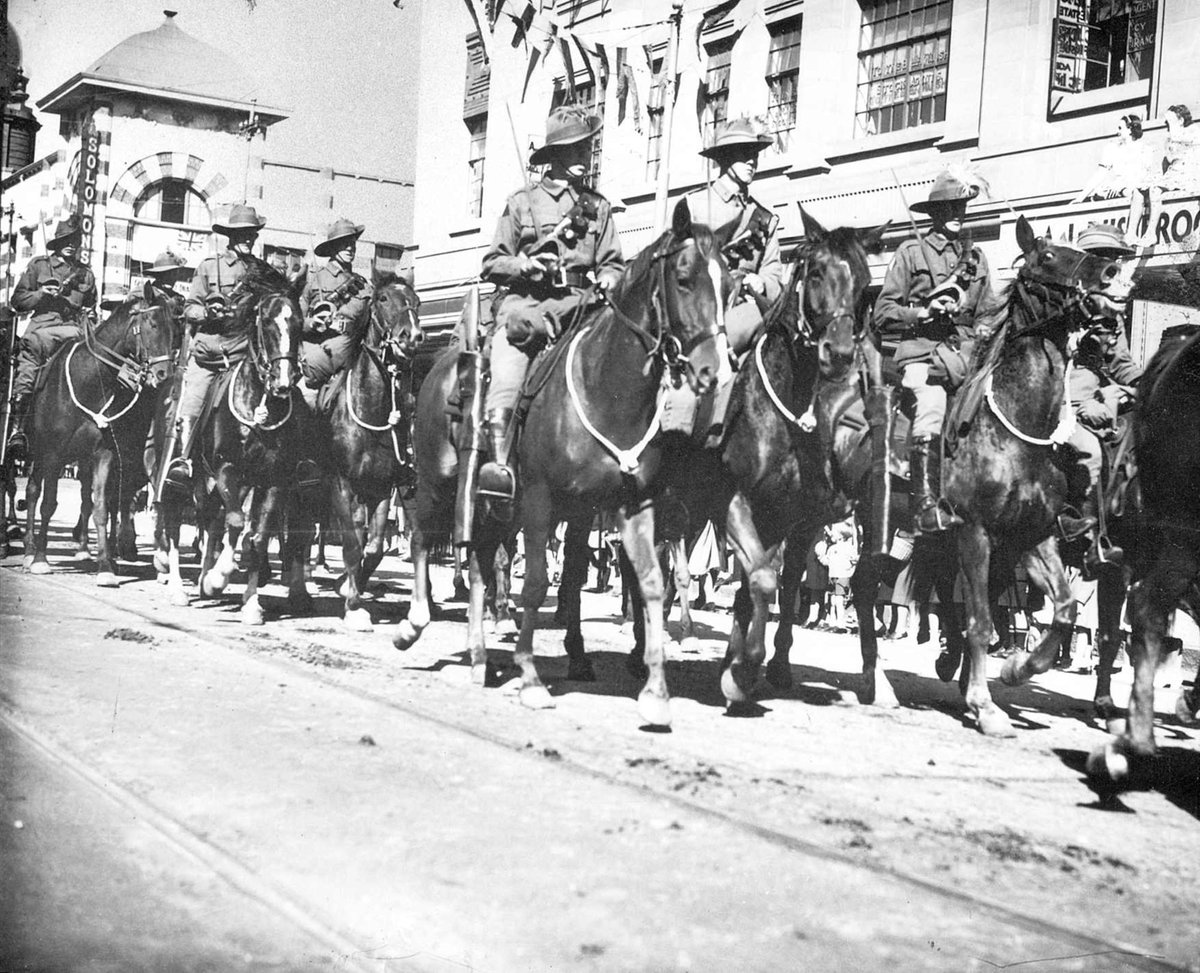 Australian soldiers marching through Melbourne streets, Melbourne City (1940–45)