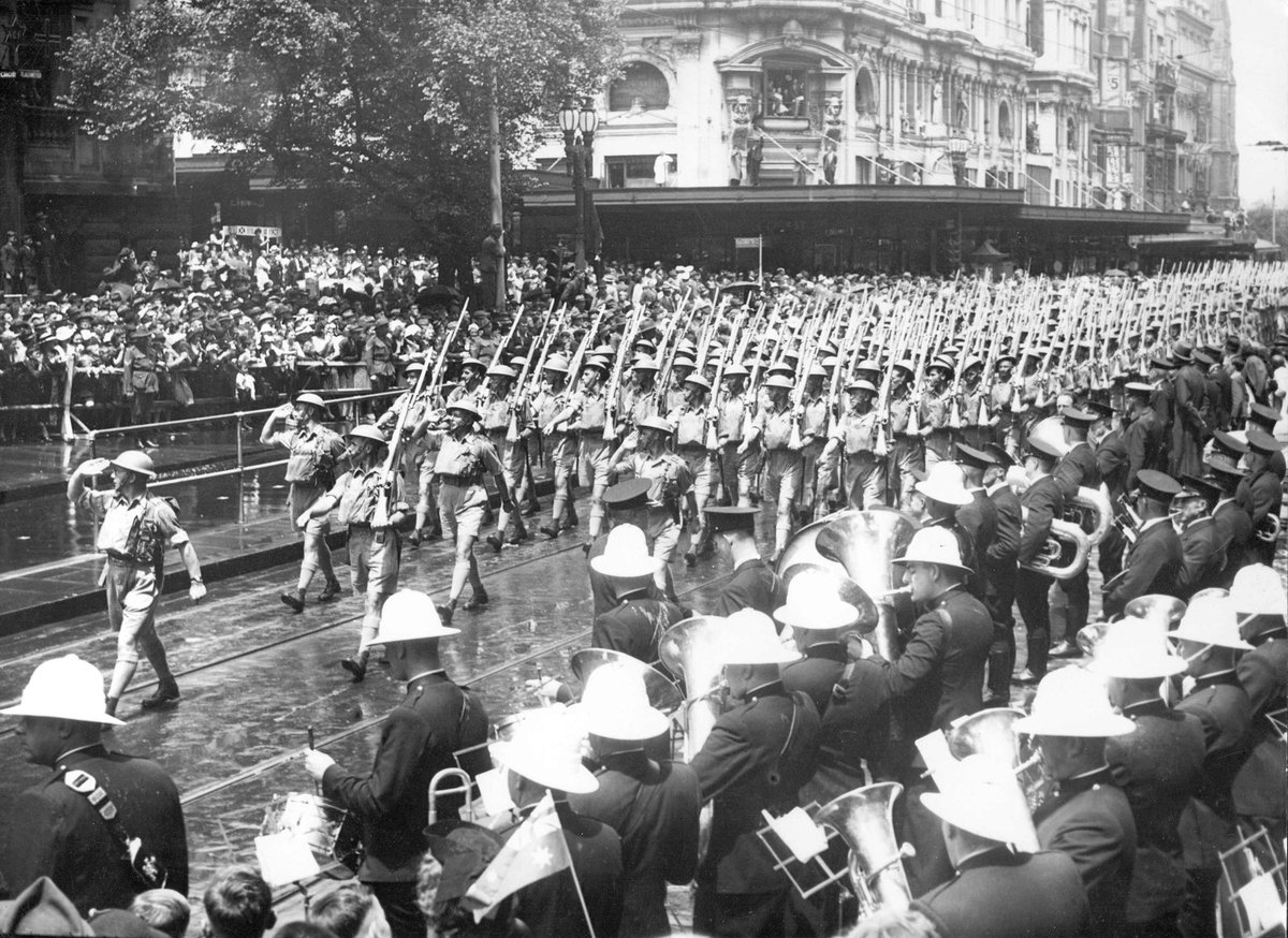 Australian servicemen marching down Swanston Street, past the saluting base at the Melbourne Town Hall, Melbourne City (1940–45)