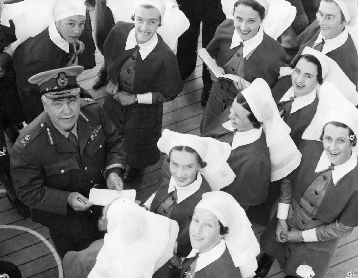 Blamey signing autograph for nurses before leaving Melbourne (c. 1940)