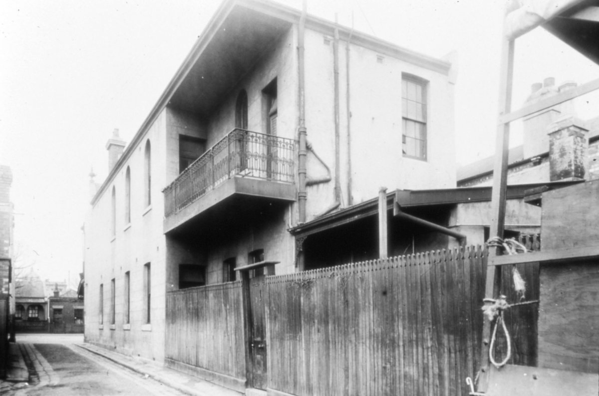 Melbourne. Two storey building with iron balcony (c. 1935)