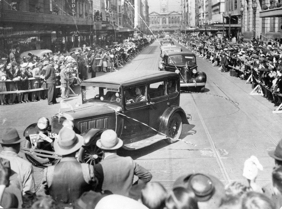 Procession of invalided soldiers travelling in motor cars up Elizabeth Street and turning into Bourke Street, Melbourne, Melbourne City (1940–45)