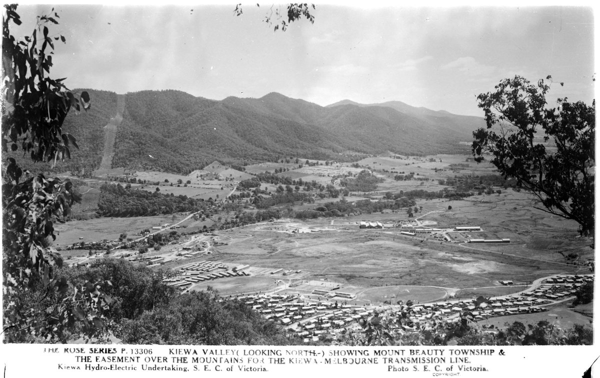 KIEWA VALLEY (LOOKING NORTH) SHOWING MOUNT BEAUTY TOWNSHIP & THE EASEMENT OVER THE MOUNTAINS FOR THE KIEWA-MELBOURNE TRANSMISSION LINE (1920–54)