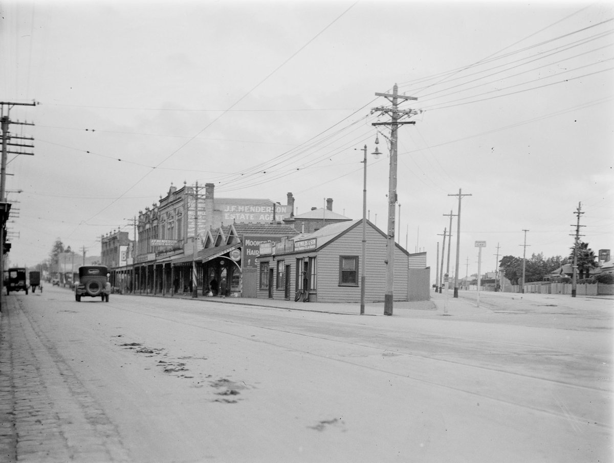 Commercial buildings, including J. F. Henderson Estate Agents and Moonee Ponds Hairdressers, Moonee Ponds (1925–35)