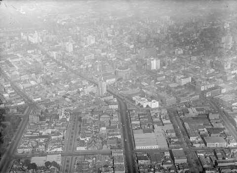 Looking south over City of Melbourne, State Library and Russell Street Police Station in centre of image, c. 1948