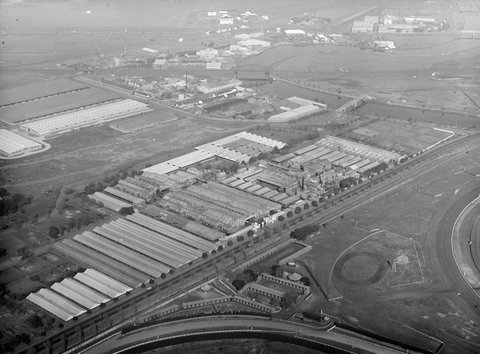 Looking south-east over Flemington Racecourse to Abattoirs, c. 1948