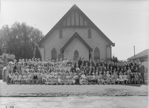 Large group of men, women and children outside Church of Christ, Berry Street, North Essendon, 1951?