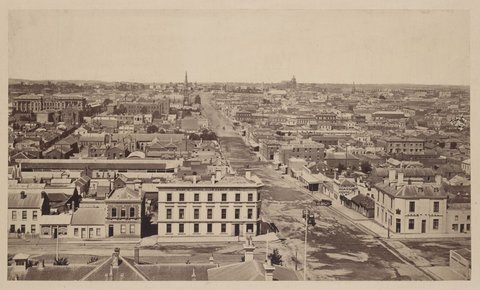 Looking east along Lonsdale St. from Queen St, 1869