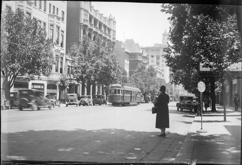 Oblique view showing Collins Street (south side) between Russell Street and Exhibition Street facing the T & G tower, 1902–34