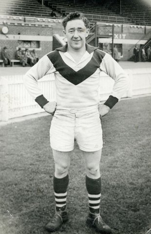 "Two South Melbourne football players, Eddie Lane and an unidentified player, standing on field", 1951–54