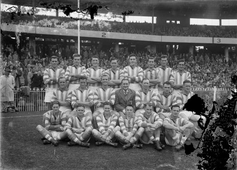 [North Melbourne senior team in front of outer grandstand, MCG], c. 1949