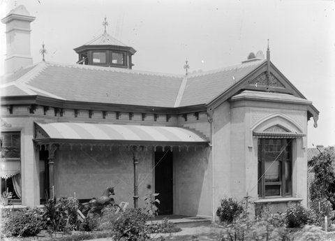 "Mynda," 5 Molesworth Street, Kew, shows rocking horse on front verandah, 1890–1910