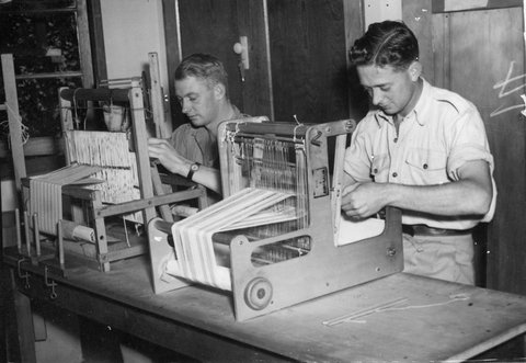 Corporal H.L. Ripper and Lance Corporal E.C. Tickell weaving scarves at Rockingham Convalescent Home, Kew, c. 1943