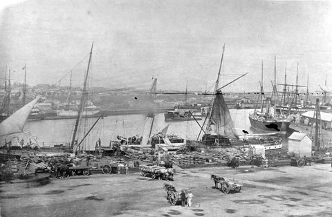 View of docks along the Yarra River?, c. 1920
