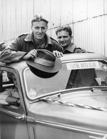 Two five-year veterans driven through streets of Melbourne after their return from overseas, 1945