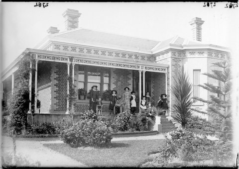 Family posed on verandah of house, probably in Melbourne, 1890–1910
