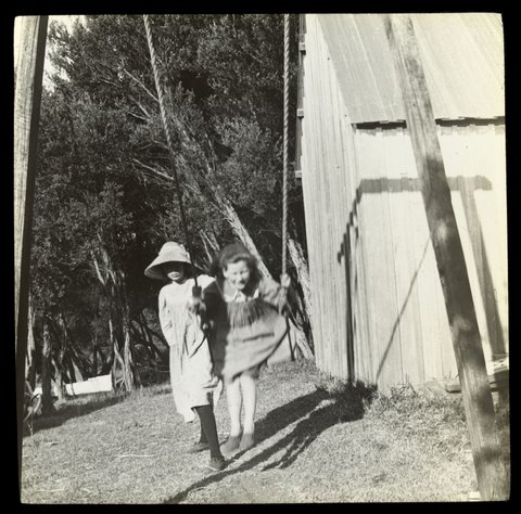 Gertrude and Clare on swing - "Ivanhoe" 1909 [Sorrento] [slide]