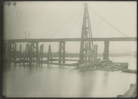 South Kensington to West Footscray, pile-driving, temporary bridge for use in erection of 175' span, in bridge over Maribyrnong River, 1927