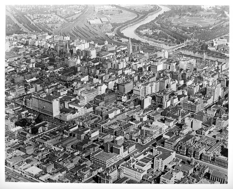 Aerial view of Melbourne looking south east from above the corner of Lonsdale and Elizabeth Streets, 1935–36