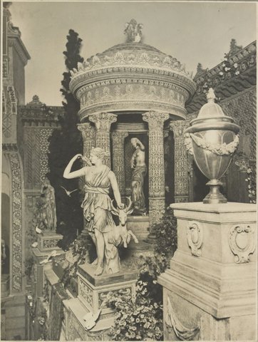 View of the interior of auditorium at the State Theatre Melbourne towards the right hand side of the stage showing statue of Diana of Versailles with stag, a temple with a statue of Aphrodite and an urn on a pedestal in the foreground, c. 1928