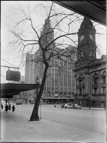Melbourne Town Hall and Manchester Unity Building from Collins Street, 1948?