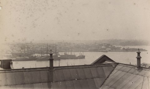 [View over corrugated iron rooftops, possibly towards Yarra River], 1880–1910