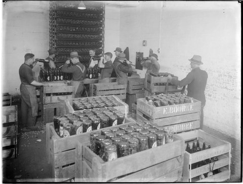 Loading the bottle washer, Carlton Brewery, 1938