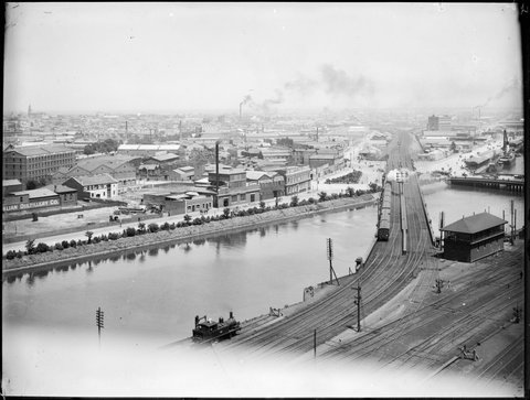 [Elevated view across Yarra River along railway bridge], 1893–1914