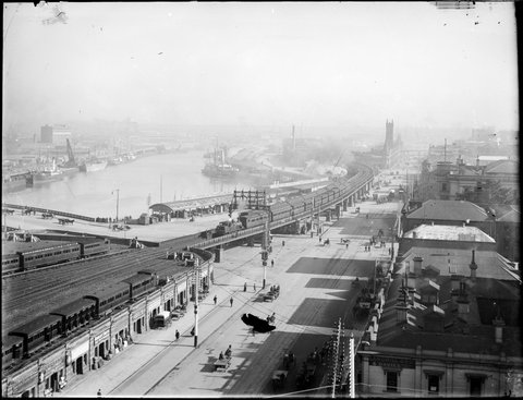 [View south east across Flinders Street towards Queens Bridge and Queens Wharf], 1911