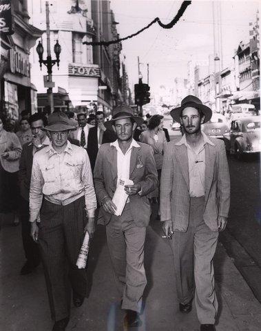 Bushmen after their three months trek with 2000 sheep arrive in Melbourne, c. 1954