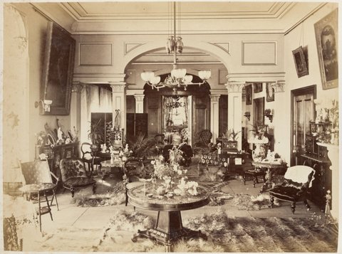 Another view of the interior of Fairlie House, Anderson Street, South Yarra, looking towards large wood panelled folding doors into the dining room, 1882