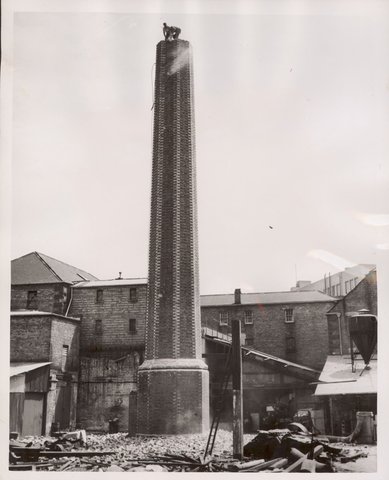 Chimney being demonlished [i.e. demolished] at Carlton, 1954