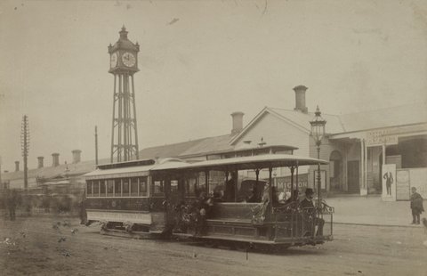 Tram in front of former Flinders Street Station, c. 1900