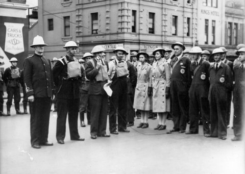 Officials of different organizations watching A.R.P. [i.e. Air Raid Precautions] display Melbourne, c. 1943