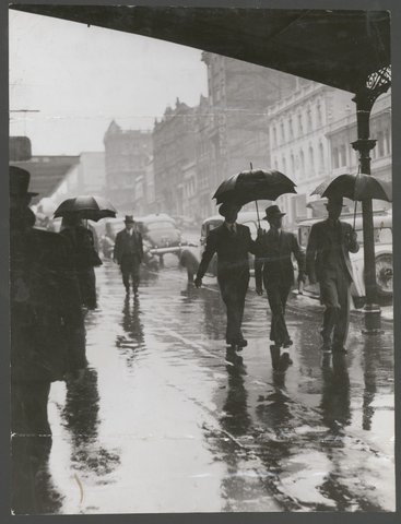 Wet weather in Bourke Street, 1944