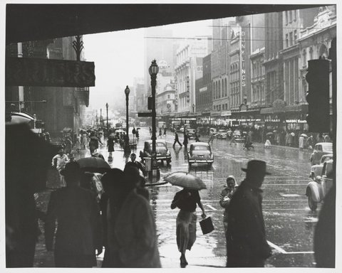 Sudden wet weather in Melb. [i.e. Melbourne] streets, 1953