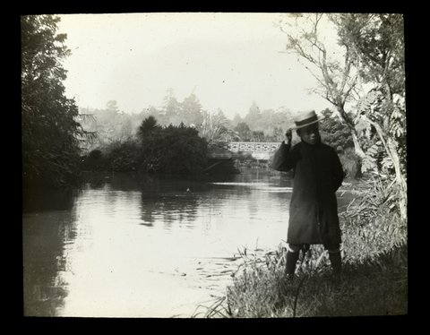 John [Wardell] standing beside lake - Melbourne Botanic Gardens or Yarra River ?, 1910–20