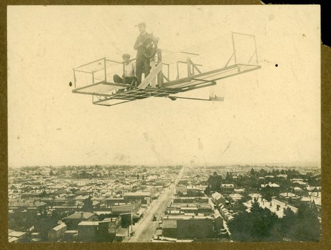 Flying machine over High Street, Armadale, c. 1900
