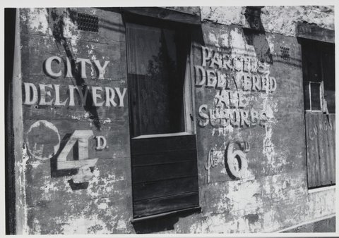 Rendered wall with old sign-writing, possibly the Eastern Market, Exhibition Street, Melbourne, 1940–54