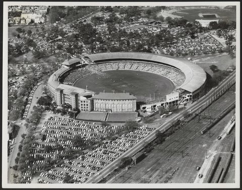 Aerial view of the Melbourne Cricket Ground showing the old stand, 1952