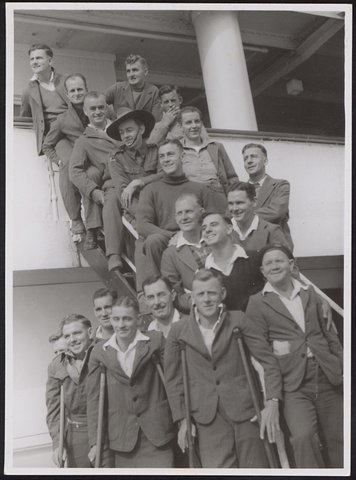 Members of the A.I.F. invalided from the Middle East, disembarking from a hospital ship, Melbourne, 1942