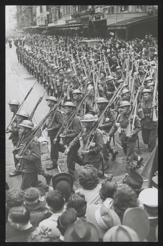 Men of the 17th Brigade ... given a tumultuous welcome ... when they marched through Melbourne, 1942