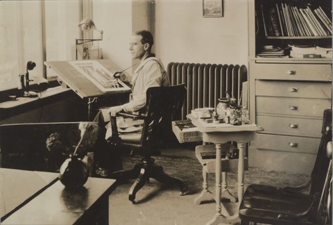 [Elton Fox, seated at his design desk, Fox Art Academy, Melbourne], 1935–40