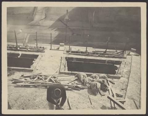 View from the roof of the dome looking down at the statue of Sir Francis Ormond in the forecourt of the Working Mens' College (now RMIT) in La Trobe Street, showing two of the dome lights, c. 1912